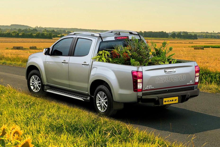Isuzu S Cab Z side-profile view highlighting roofline, stance, and proportion