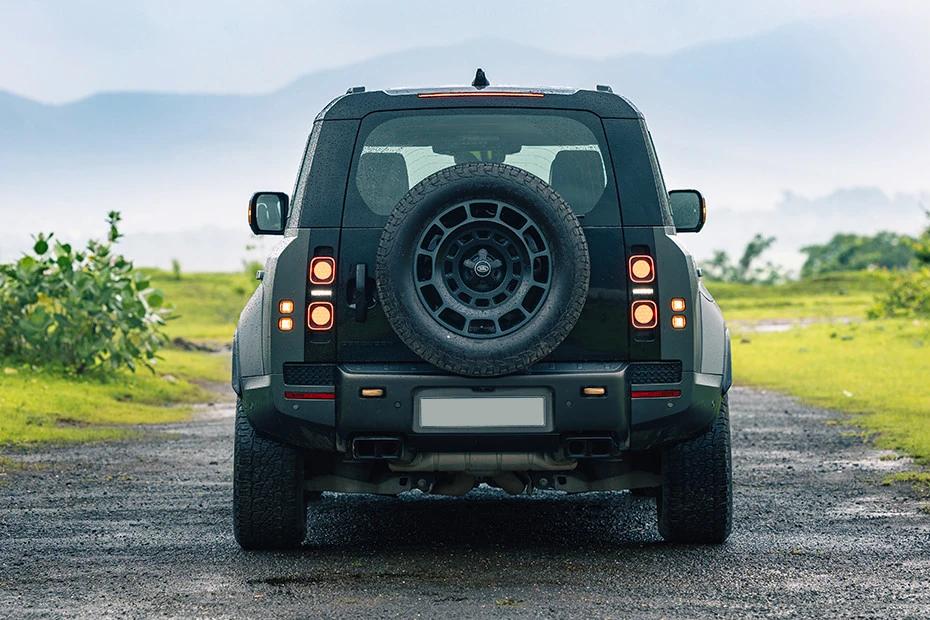 Land Rover Defender rear-view view highlighting width, presence, and balance