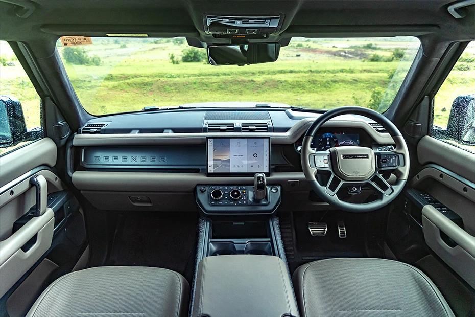 Land Rover Defender dashboard view highlighting layout, materials, and clarity
