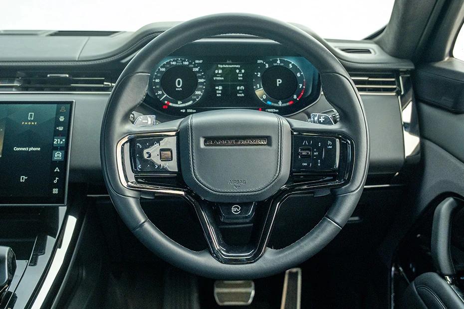 Land Rover Range Rover Sport steering-wheel view highlighting grip, controls, and comfort