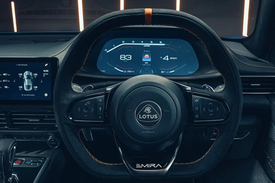 Lotus Emira steering-wheel view highlighting grip, controls, and comfort