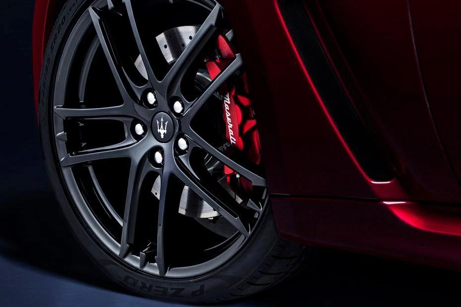 Maserati Gran Turismo wheel-closeup view highlighting pattern, finish, and attitude