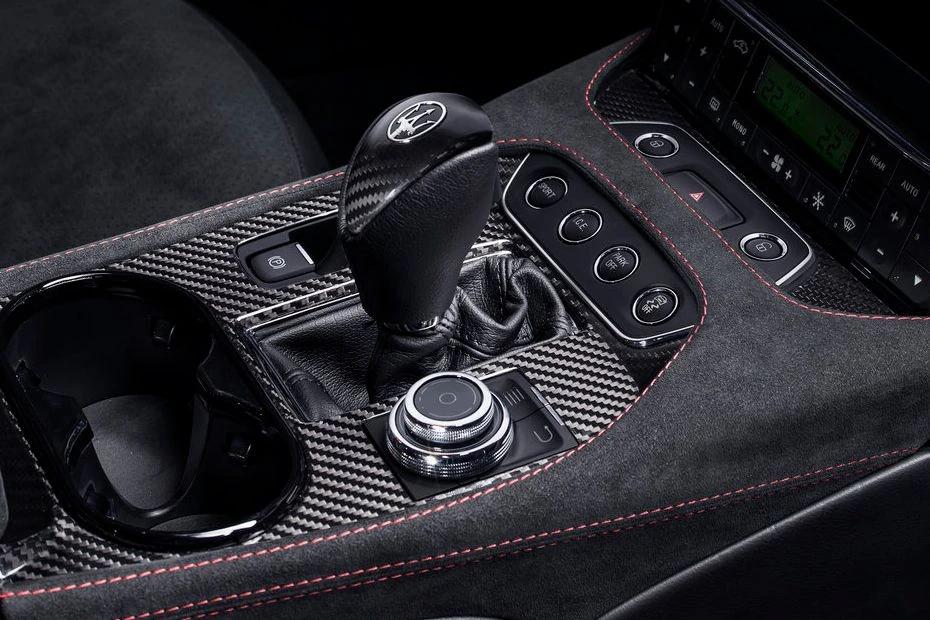 Maserati Gran Turismo console-view view highlighting storage, controls, and ergonomics