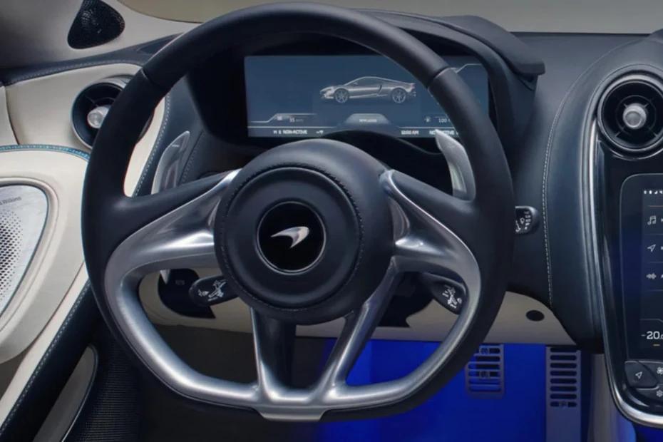 Mclaren Gt steering-wheel view highlighting grip, controls, and comfort