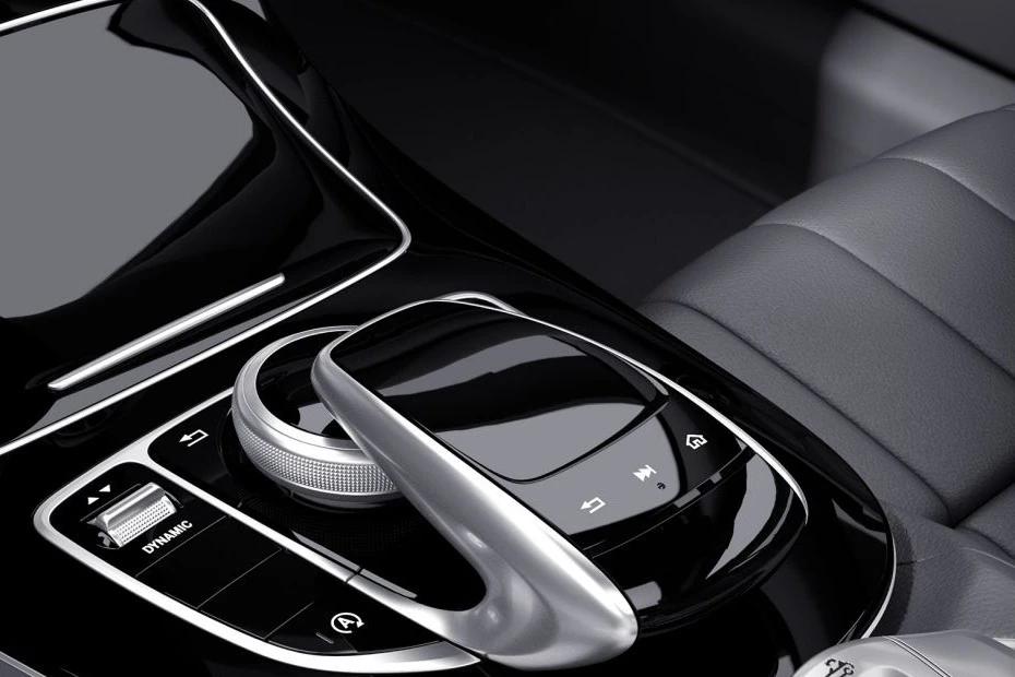 Mercedes Benz Amg E 53 Cabriolet console-view view highlighting storage, controls, and ergonomics
