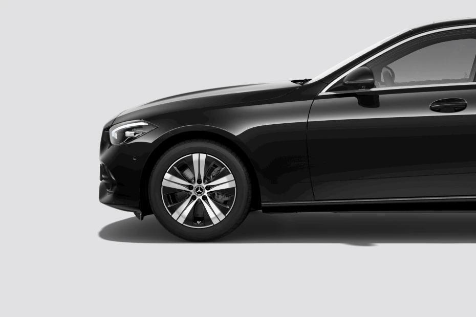 Mercedes Benz C Class console-view view highlighting storage, controls, and ergonomics