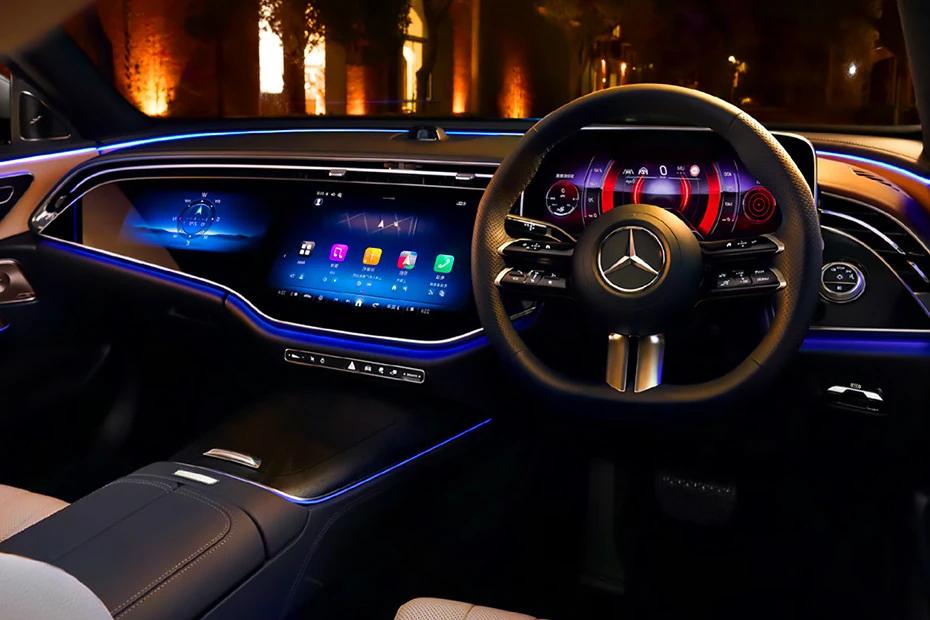 Mercedes Benz E Class dashboard view highlighting layout, materials, and clarity