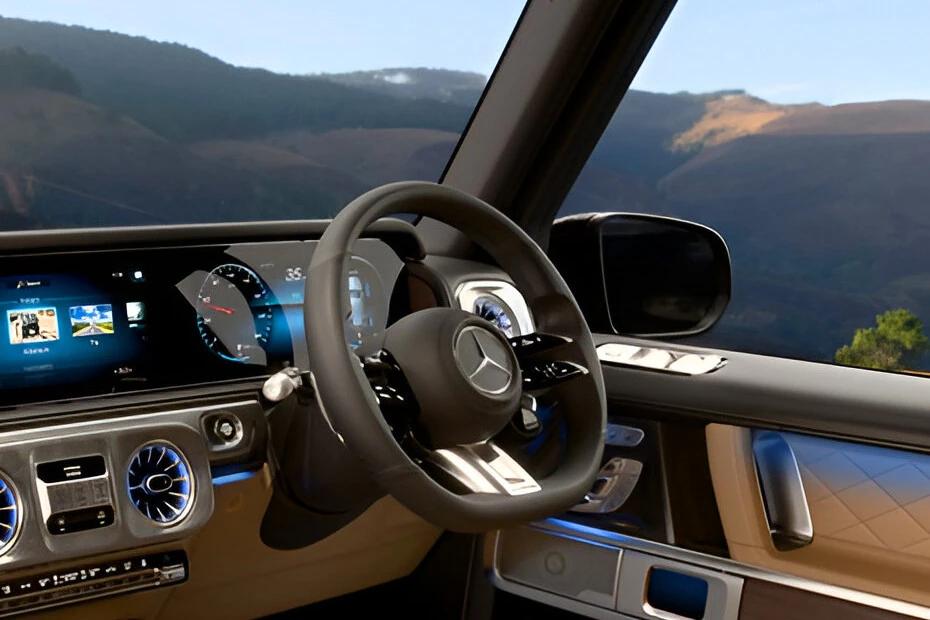 Mercedes Benz G Class steering-wheel view highlighting grip, controls, and comfort