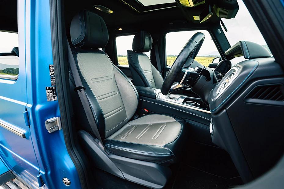 Mercedes Benz G Class Electric front-seats view highlighting support, padding, and comfort