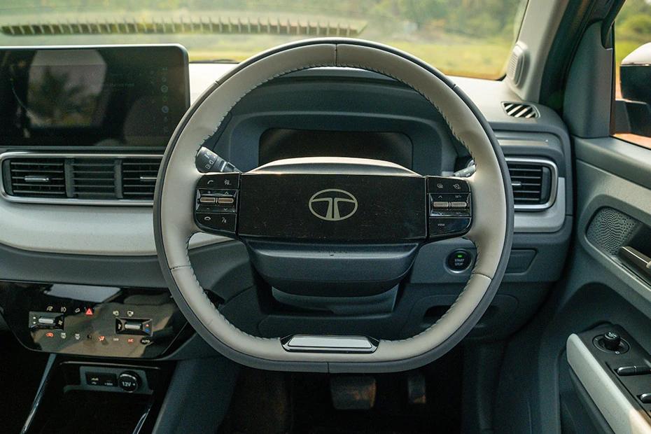 Tata Punch Ev steering-wheel view highlighting grip, controls, and comfort