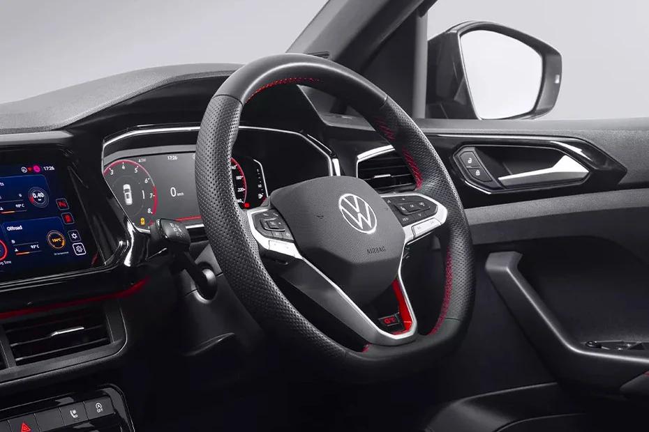 Volkswagen Taigun steering-wheel view highlighting grip, controls, and comfort